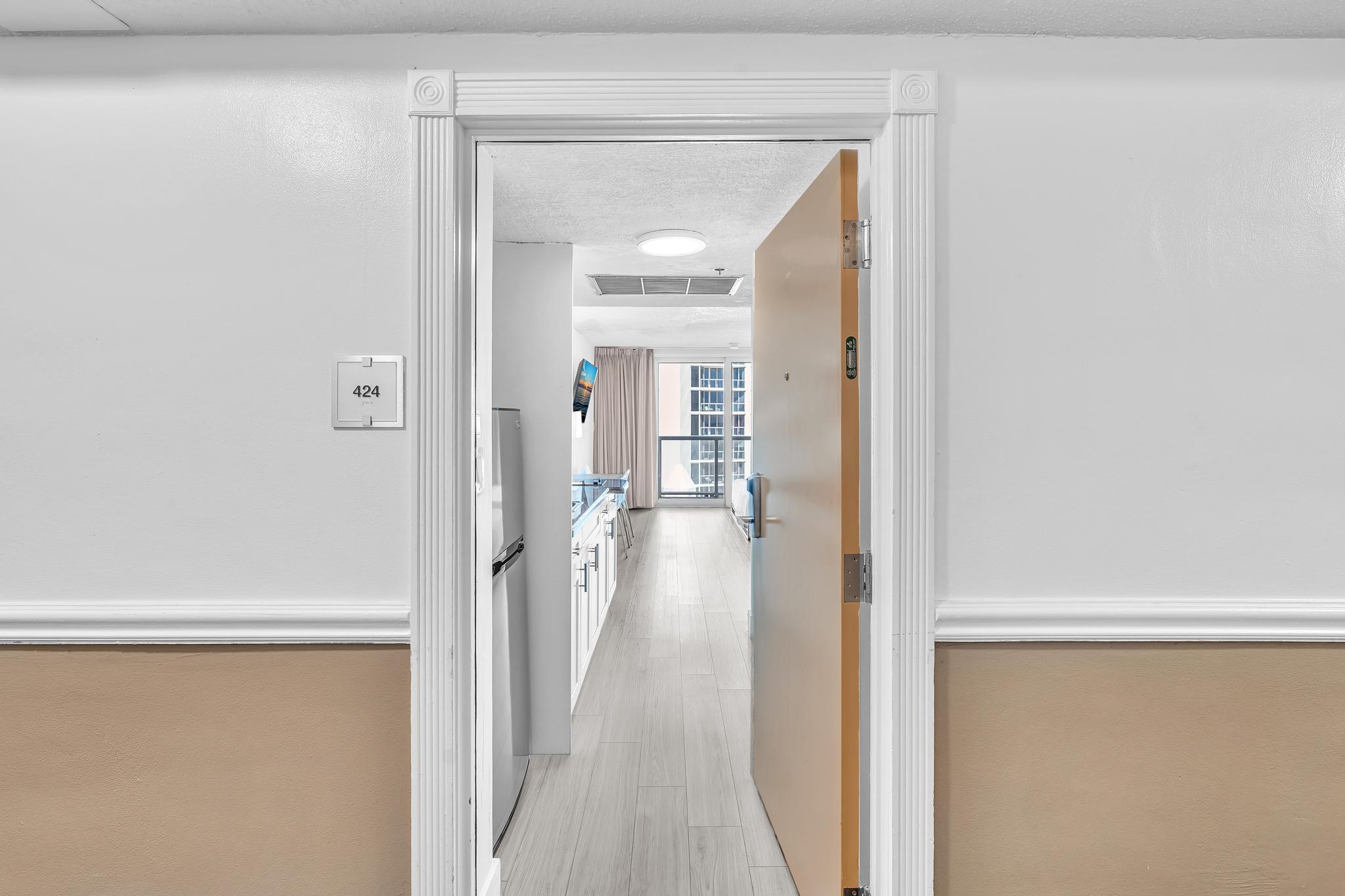 Studio Retreat with Balcony and Partial Ocean View- 424