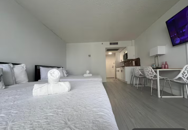 Studio Retreat with Balcony and Partial Ocean View- 424